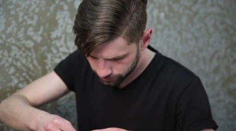 Cutting man's beard with the straight razor Stock Footage 62979819