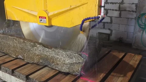 Cutting marble or granite with a saw or multi saw, Block multi blade cutter, Mul Stock Footage 169174529