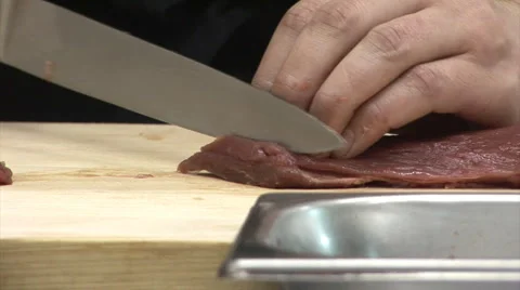 Cutting the meat 1 Stock Footage 3989095