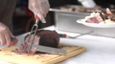 Cutting the meat Stock Footage 74128175