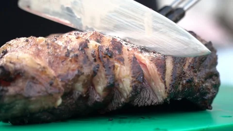 Cutting meat Stock Footage 127869017