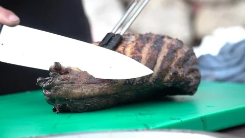 Cutting meat Stock Footage 127869036