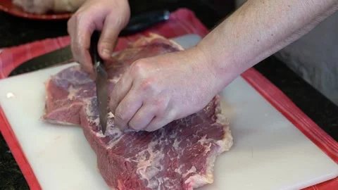 Cutting Meat Stock Footage 142148393