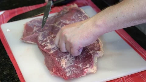 Cutting Meat Stock Footage 142148410