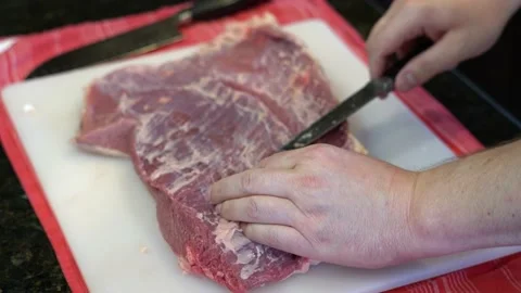Cutting Meat Stock Footage 142148446