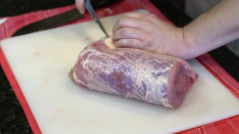 Cutting Meat Stock Footage 142151006