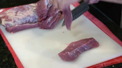 Cutting Meat Stock Footage 142152475