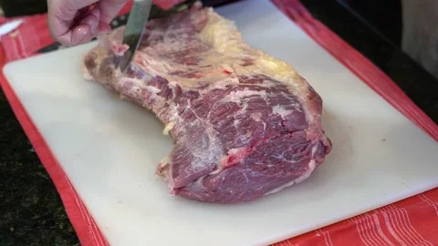 Cutting Meat Stock Footage 142156325