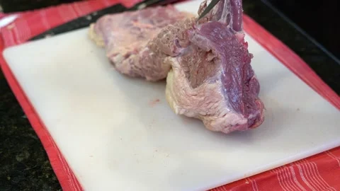 Cutting Meat Stock Footage 142157119