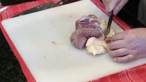 Cutting Meat Stock Footage 142161960