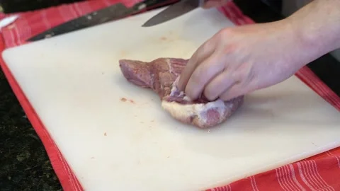 Cutting Meat Stock Footage 142162288