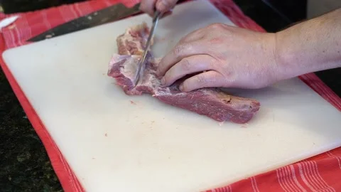 Cutting Meat Stock Footage 142162409