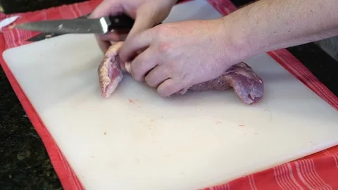 Cutting Meat Stock Footage 142162553