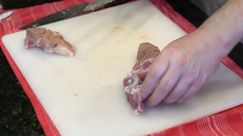 Cutting Meat Stock Footage 142162907