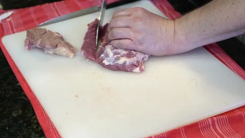 Cutting Meat Stock Footage 142162948