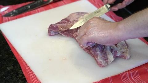 Cutting Meat Stock Footage 142166829