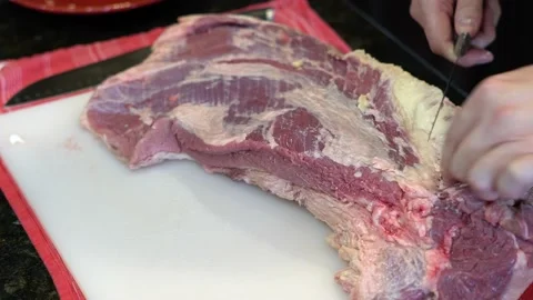 Cutting Meat Stock Footage 142168369