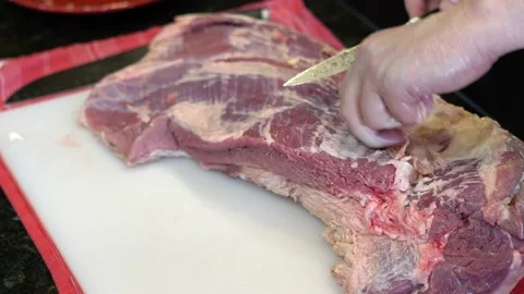 Cutting Meat Stock Footage 142168938