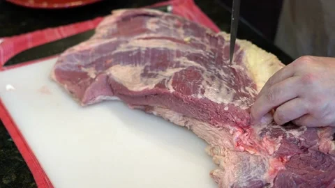 Cutting Meat Stock Footage 142168976