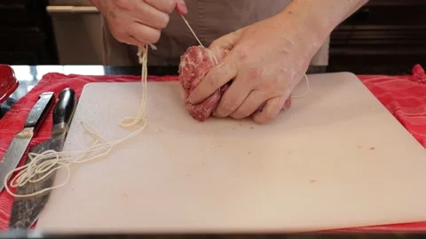 Cutting Meat Stock Footage 142221040