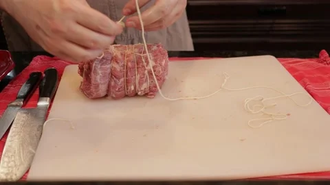Cutting Meat Stock Footage 142222342