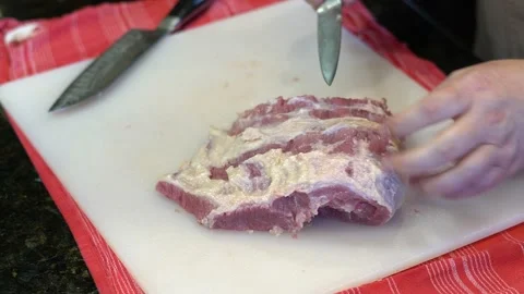 Cutting Meat Stock Footage 142222445