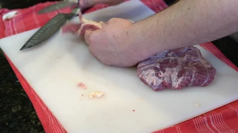 Cutting Meat Stock Footage 142223496