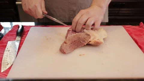 Cutting Meat Stock Footage 142226777