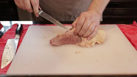 Cutting Meat Stock Footage 142226786