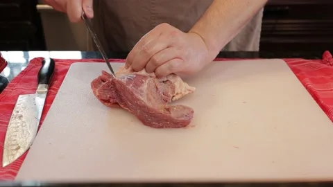 Cutting Meat Stock Footage 142227084