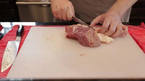 Cutting Meat Stock Footage 142227094