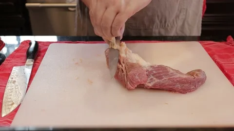 Cutting Meat Stock Footage 142227652