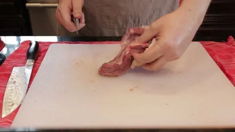 Cutting Meat Stock Footage 142227687