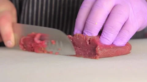 Cutting the meat. fresh raw beef meat on chopping board. Stock Footage 169771303