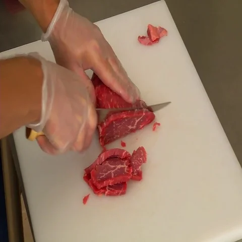 Cutting meat for Jerky Stock Footage 69650453
