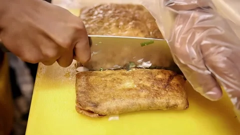 Cutting meat martabak close up Stock Footage 273040716