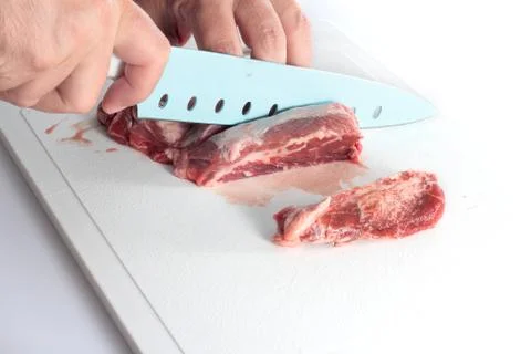 Cutting meat Stock Photos