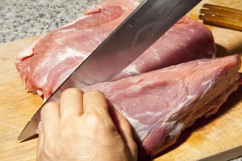 Cutting meat Foto stock