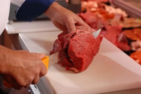 Cutting meat Stock Photos