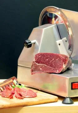 Cutting meat Stock Photos