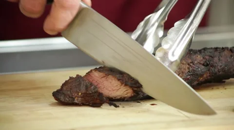 Cutting the meat with a sharp knife Stock Footage 48169113