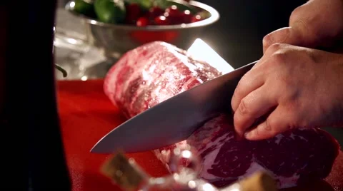 Cutting meat in slow motion Stock Footage 67856988