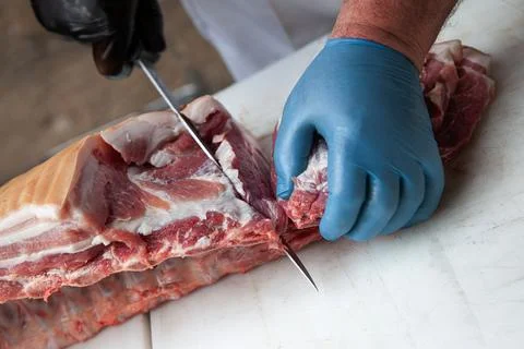 Cutting meat on the stall Stock Photos