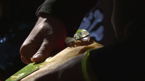 Cutting meat from top of pumpkin into the plate Stock-Footage 67665486