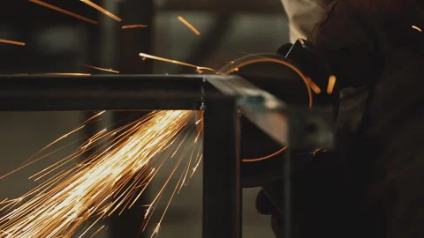 CUTTING METAL WITH ANGLE GRINDER Stock Footage 306691821