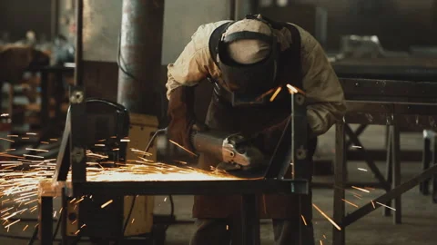 CUTTING METAL WITH ANGLE GRINDER Stock Footage 306691831