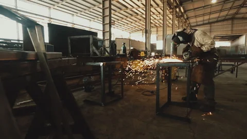 CUTTING METAL WITH ANGLE GRINDER Stock Footage 306691880