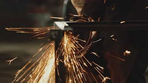 CUTTING METAL WITH ANGLE GRINDER Stock Footage 306691903