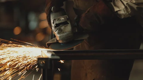 CUTTING METAL WITH ANGLE GRINDER Stock Footage 306691905