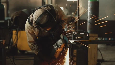 CUTTING METAL WITH ANGLE GRINDER Stock Footage 306691916